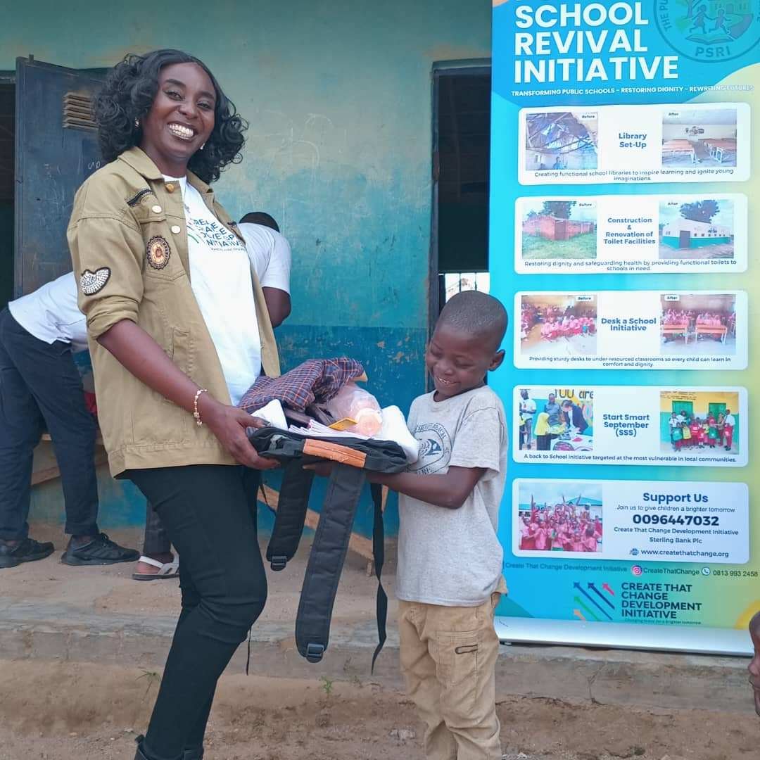 A volunteer Presenting the kit to a child
