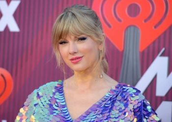 Taylor Swift Makes History as First Artist to Top Charts with Album, Film, and Song