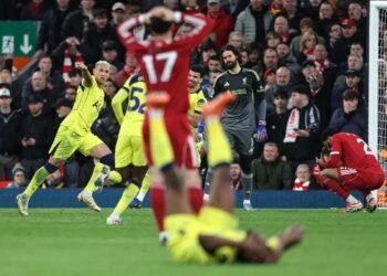 Tottenham strike late to stun Liverpool, end losing streak