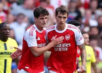 Arsenal players celebrating during a pre-season football match against Villarreal at Emirates Stadium