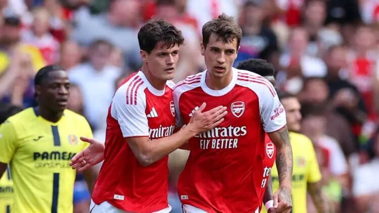 Arsenal players celebrating during a pre-season football match against Villarreal at Emirates Stadium
